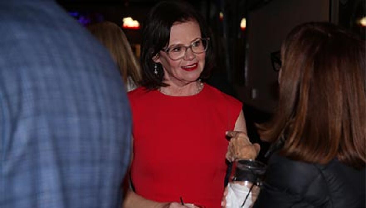  Laura Kropp interacts with guests at her campaign party at Orleans Sports Cafe on Nov. 4. Kropp was elected to her third term as mayor of Mount Clemens. 