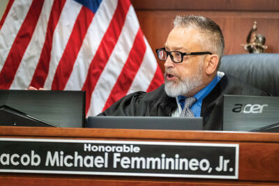  Judge Jacob Femminineo Jr. presides over the exam. 