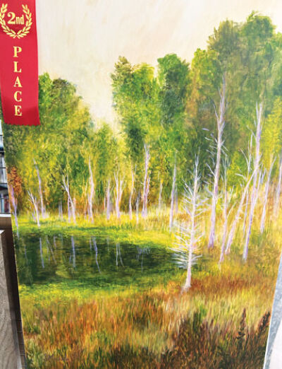  Sue Michels found inspiration for “Ghost Forest” in Hastings, Michigan. The painting was the second-place winner in the Shelby Township Fine Art Society’s fall art show.  