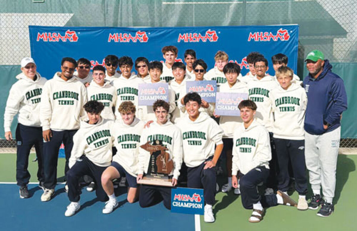  Cranbrook tennis poses with the 2025 Division 3 state championship trophy Oct. 25 in Midland. 