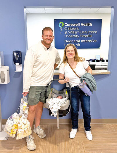  Mallory and Matthew Meyer hold John Tyler at Corewell Health William Beaumont University Hospital in Royal Oak. 