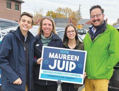  Campaigning for Grosse Pointe City Councilwoman Maureen Juip on Election Day were two of her children, Tommy, 13, and Ellie, 14, along with her husband, Randy.  
