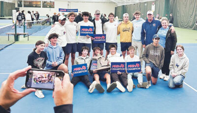  Grosse Pointe Woods University Liggett poses on the courts at Midland Tennis Center on Oct. 21 after receiving the 2025 Division 4 boys tennis championship trophy. 