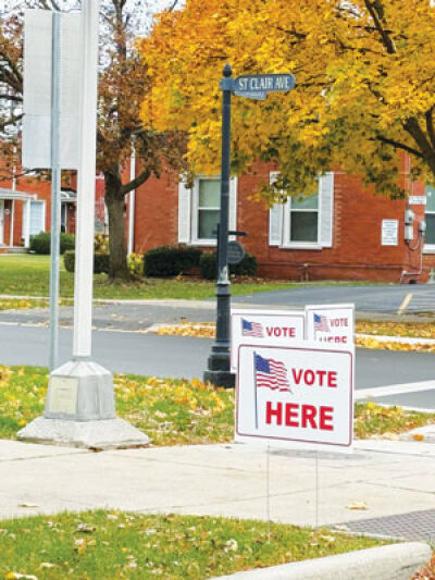  Signs like these — outside the Neighborhood Club in Grosse Pointe City — directed voters where to cast their ballots on Election Day. 