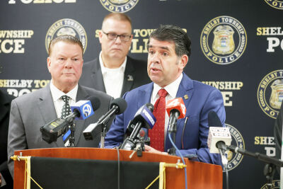  Shelby Township Police Chief Robert Shelide, with Macomb County Prosecutor Peter Lucido, left, speaks to the media Nov. 11 during a press conference at the Police Department. Shelide spoke about how police came to arrest a suspect in a double homicide at a used car dealership Nov. 7. 