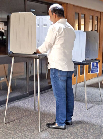  Aravind Reddy casts his ballot in the 2025 election on Nov. 4. 