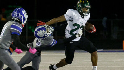  Groves junior Jeremiah Whitley sheds a tackle from Lakeview’s K’alon Williams. 