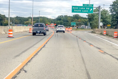  Drivers approaching Kent Lake Road on eastbound Interstate 96 in Lyon Township encounter the new orange safety markings in the construction zone. 