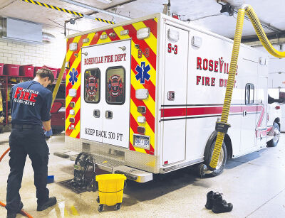  Roseville firefighter/medic Joshua Linkewitz washes down an ambulance while on duty Nov. 12 at station No. 1 at 18750 Common Road, which is currently undergoing renovations. Linkewitz just came off his one-year probationary period. 