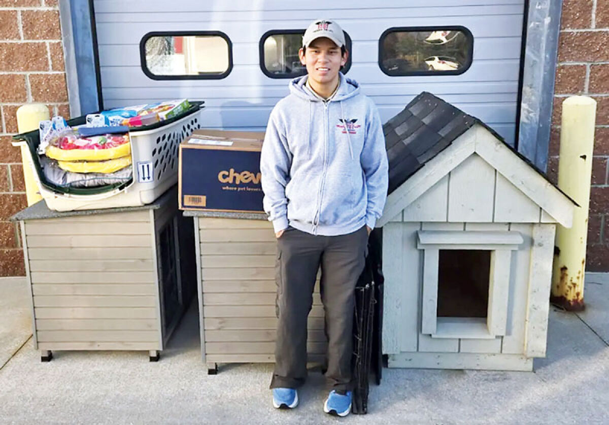  Troy High School senior Shawn Rankin helped build doghouses and bring in donations of money and supplies for the Oakland County Animal Control and Pet Adoption Center, part of his Eagle Scout project. 