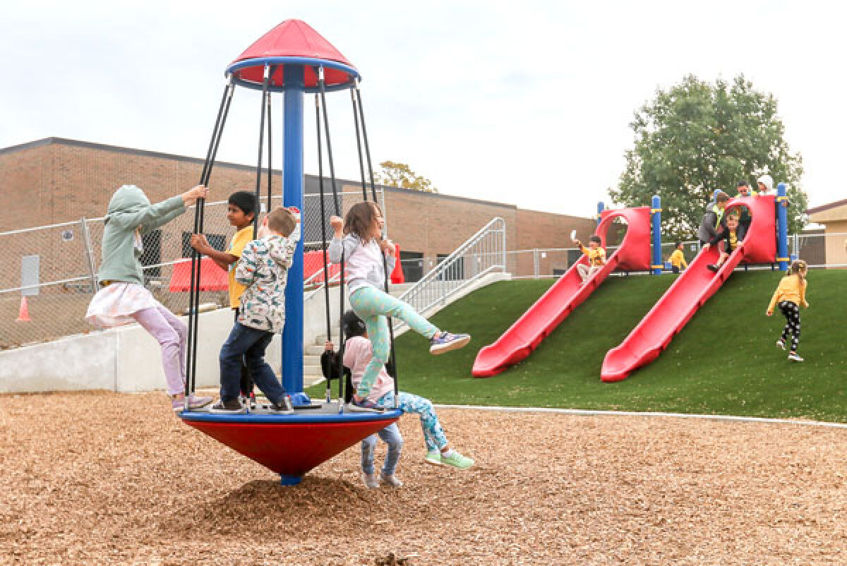  Students try out some of the new playground equipment Oct. 6. 