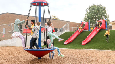  Students try out some of the new playground equipment Oct. 6. 