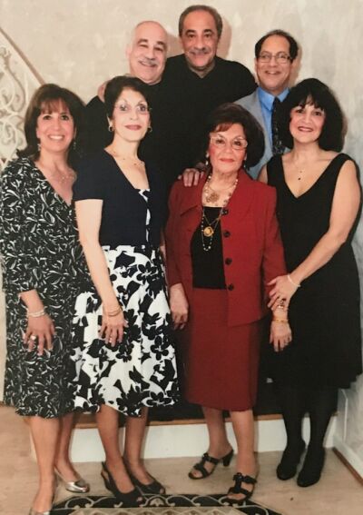  Emily’s Delicatessen, which specializes in Lebanese cuisine, opened in 1971 as a family business. Pictured bottom from left: Mary, Emma, mother Emily and Joanie. Top from left: Sam Sr., Roy and Maroun. Emma, Emily, Maroun and Sam Sr. have since passed away. 