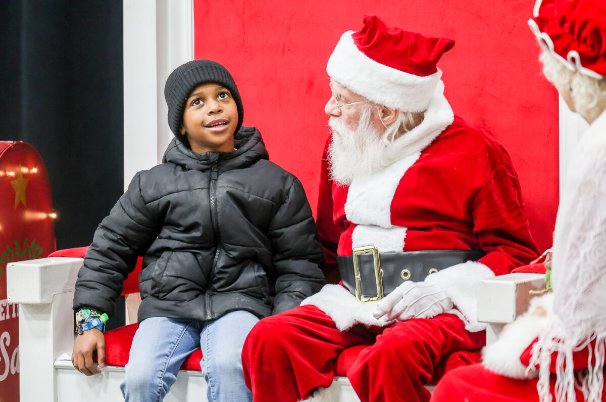  Ashton McFarland, 6, of Southfield, visits with Santa at the at the annual Southfield Tree Lighting Ceremony Dec. 2 at the Southfield Municipal Campus 