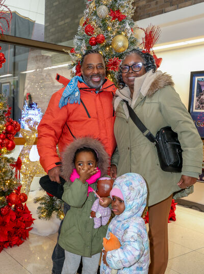  James and Helena Parker, of Southfield, attend the tree lighting and festivities with their grandchildren.  
