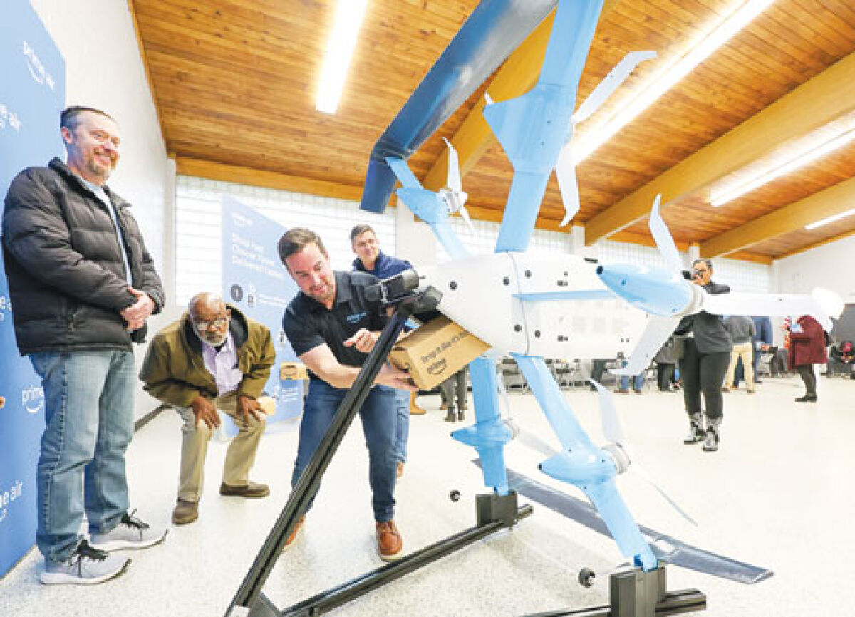  During an event at the Hazel Park Community Center Nov. 20, Kyle Degiulio, manager of economic development policy at Amazon, explains the delivery process for the MK30 drone that will deliver packages as part of Amazon’s new Prime Air program.  
