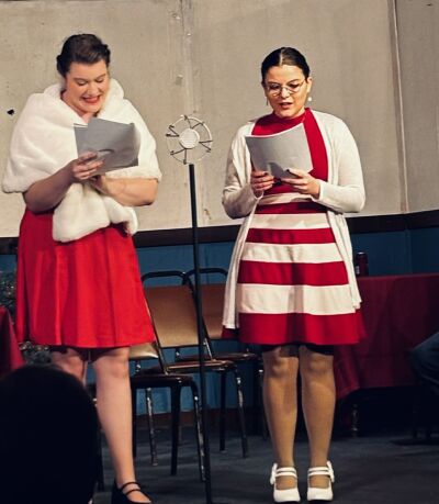  Lily Godau, left, and Teresa Ahola, right, rehearse lines for “An Evening of Radio Plays.” 