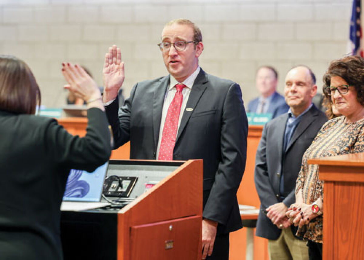  Charlie Starkman is sworn in as a new member of the Farmington Hills City Council Nov. 24. 