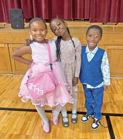  On Nov. 20, the Michigan Department of Education released Pleasantview Elementary School, in Eastpointe, from the state’s partnership agreement due to an increase in academic achievement. Pictured, from left, are first graders Elle Burton, Mamefatou Diouf and Monta’e Johnson participating in the school’s Dress to Impress Spirit Day. 