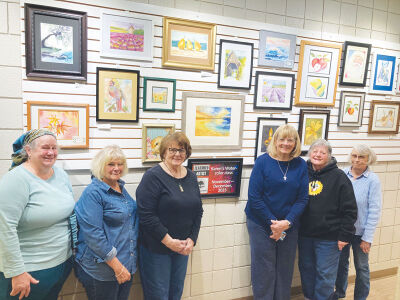  The art of watercolor instructor Karen Ann, in front, and her students is featured at the Shelby Township Activities Center through Dec. 22. 