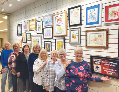  The art of watercolor instructor Karen Ann (in the navy shirt in the center) and her students is featured at the Shelby Township Activities Center through Dec. 22. 