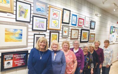  The work of watercolor instructor Karen Ann, right center, and her students is on display at the Shelby Township Activities Center.  