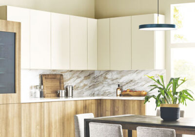  “Universal khaki,” by Sherwin-Williams, adds a soft look to kitchen cabinets. 