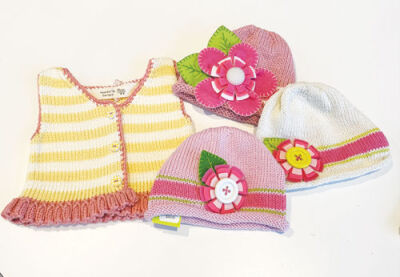  Eve Hyde makes baby knitwear, which is featured at the BBAC’s Holiday Shop.  