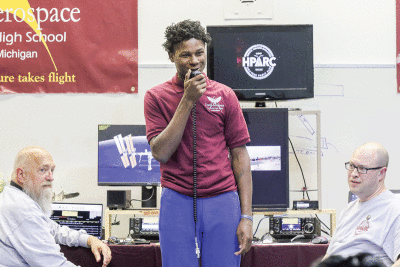  Benjamin O. Davis Aerospace Technical High School 10th grader Derek Butler asks Japanese astronaut Koichi Wakata a question.  