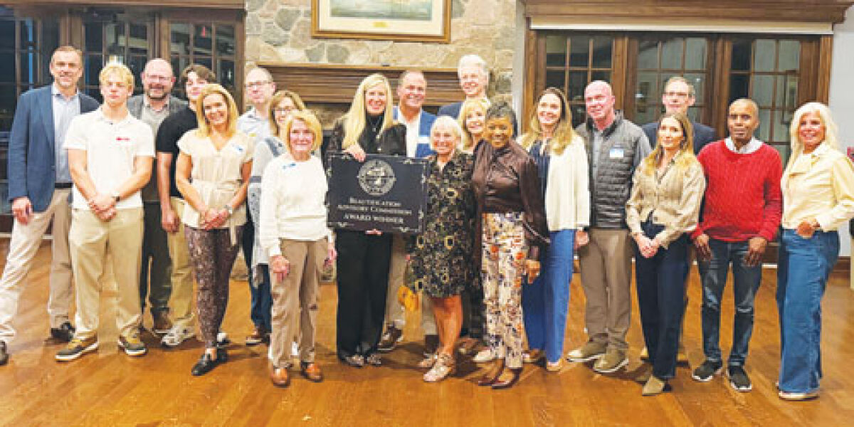  Members of the Grosse Pointe Farms Beautification Advisory Commission pose with winners of 2025 Beautification Awards Oct. 14 at the Pier Park community building. 