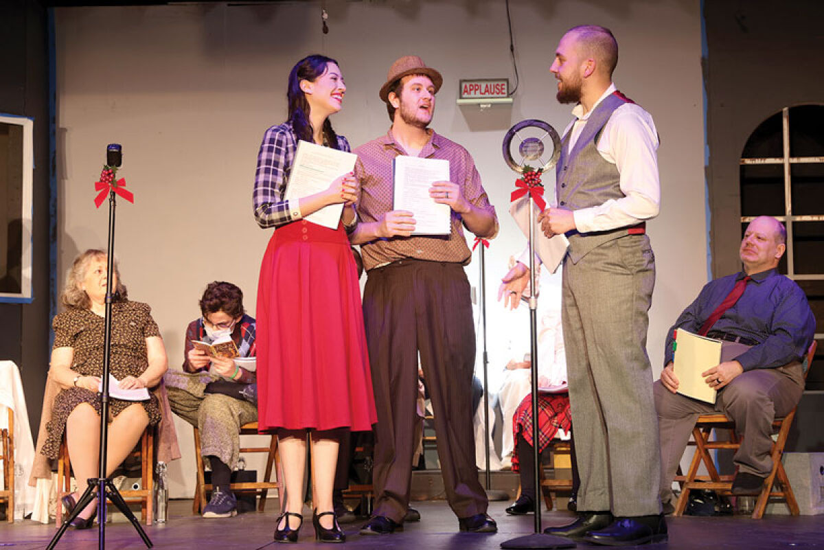  Cast members with the Ridgedale Players rehearse “It’s A Wonderful Life.” The group is putting a fresh spin on the Christmas classic, performing it in the style of a radio play. 
