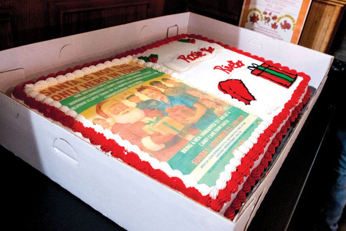  A cake recognizing several Rosie the Riveters is on display during a ceremony Nov. 23 at the American Legion Devereaux Post 141 in Howell. 