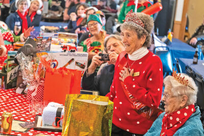 A special coin presented to Delphine Tedeski Klaput sits on a table.