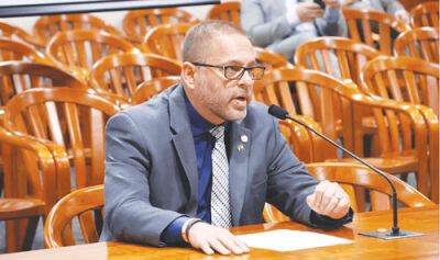  State Rep. Mike McFall, D-Hazel Park, testifies at a committee hearing in Lansing. He has proposed a statewide retirement savings program that now has bipartisan support. 