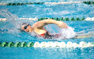  Eichbrecht swims in the pool at West Bloomfield High. 