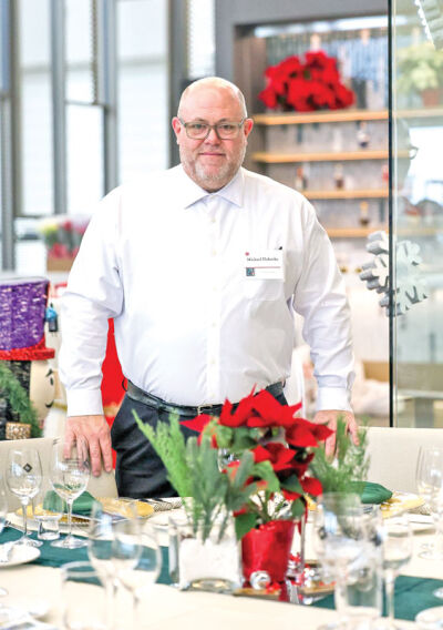  Mike Dakoske prepares for an event at Oakland Community College in Royal Oak. The first-semester student has more than 30 years of culinary industry experience and believes that school is important for his career growth. 