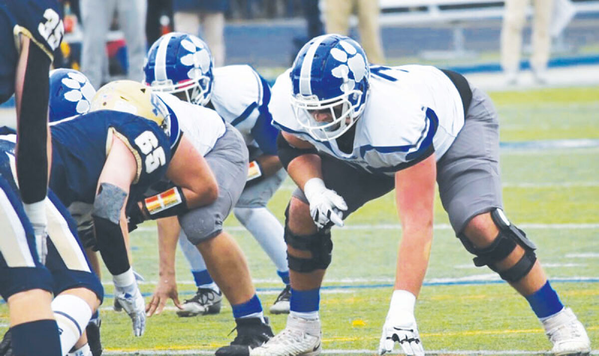  Vincenzo Pizzo lines up for a play earlier this season. Pizzo is committed to play football at the University of Toledo starting in the fall of 2026. 