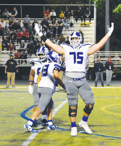 Pizzo hypes up the crowd after a big play in his senior season.