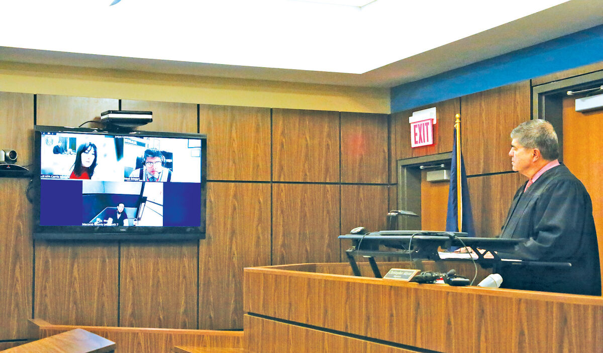  Judge Stephen Sierawski listens to Assistant Macomb County Prosecutor Carrie Seward during a hearing for Dawn Huffman, Rachard Huffman and Jasan Martin at the 41-A District Court in Shelby Township on Dec. 11. 