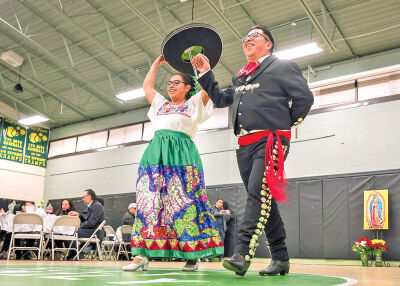  Ballet Folklorico Mexico Lindo dancers Ariana Moreno and Victor Hugo Suarez perform a traditional dance. 