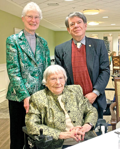  Kay Wilson poses for a picture with her son, Randy, and his wife, Beverly. 