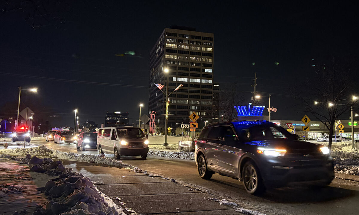  Vehicles drive into the Southfield Public Library as part of the Southfield Chanukah parade and menorah lighting on Dec. 16. 