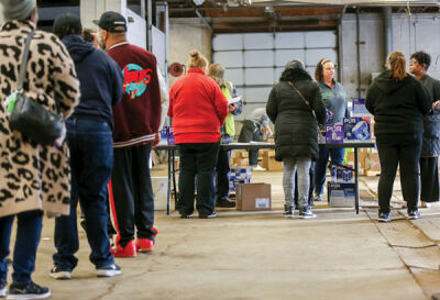  Eastpointe residents line up at a walk-in station set up at the Department of Public Works to get water filters. The wait time was much shorter for those who chose the walk-in station rather than the drive-thru stations.  