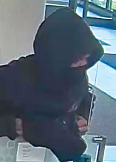  A bank robber who authorities say is Eddie Flint, of Troy, seen here in surveillance footage from Royal Oak, reportedly fled to Las Vegas, but local police departments and the FBI were able to have him taken into custody when he arrived in Nevada. 