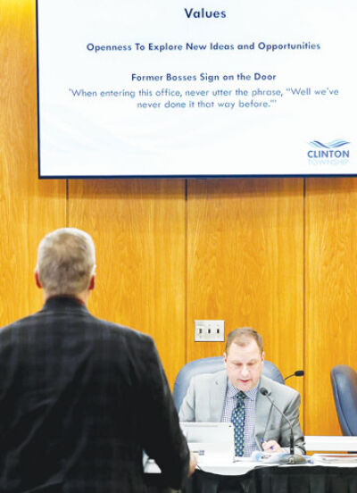  Township Supervisor Paul Gieleghem speaks through a presentation about the administrative merger of the senior center and Recreation Department at the Dec. 22 Clinton Township Board of Trustees meeting. 