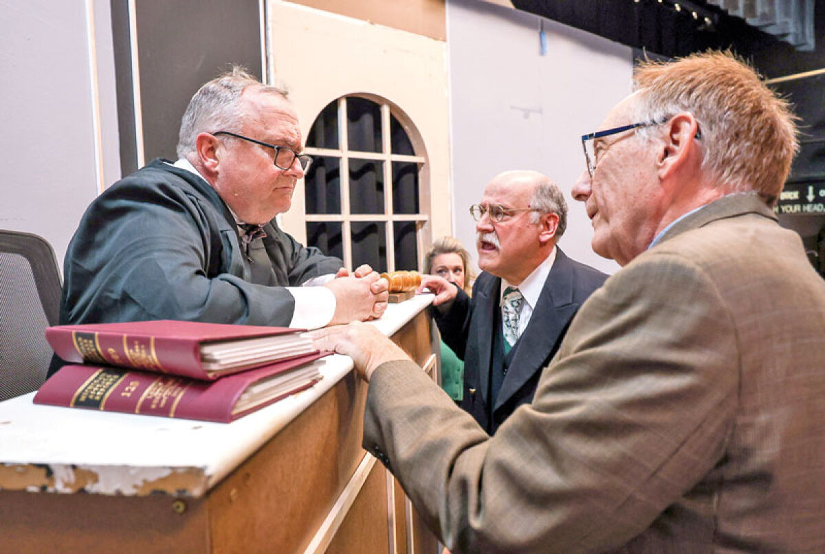  In the upcoming Ridgedale Players adaption of the “Anatomy of a Murder,” Judge Weaver — played by Phil Potter — listens to arguments from defense attorney Paul Biegler and prosecutor Claude Dancer, played by Greg Bowman and Dennis Moylan, respectively. The courtroom drama is inspired by a real-life murder mystery set in 1950s Michigan. 