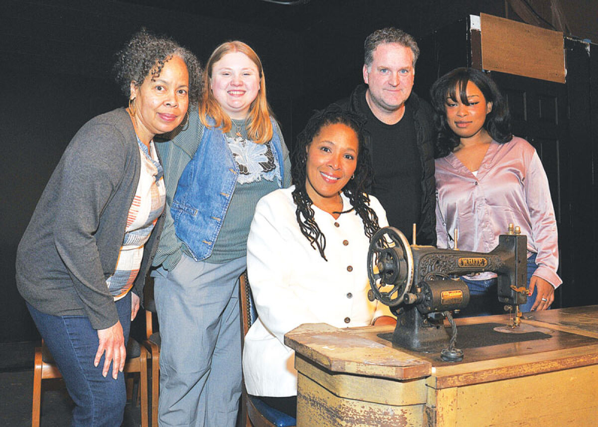  The cast of “Intimate Apparel” poses for a photograph at Peace Lutheran Church Jan. 8. 