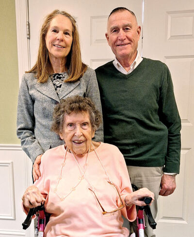  Ruby Krieg poses for a picture with her daughter, Terri, and son-in-law John Douglas after her 100th birthday celebration Jan. 9. 