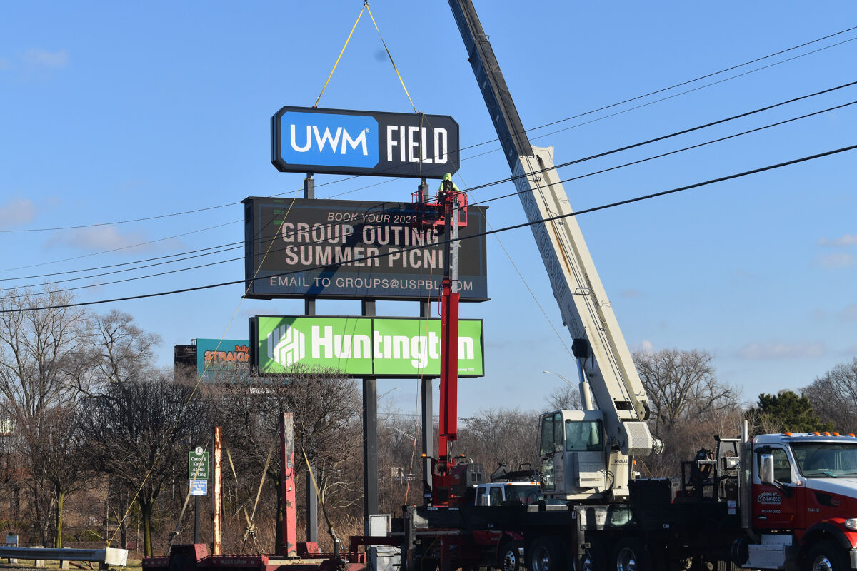  The new UWM Field marquee is put in place on Jan 13 in Utica. 